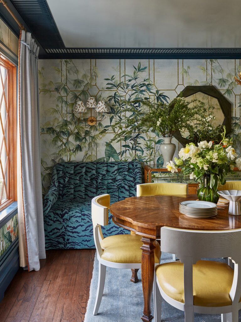 sparta new jersey colorful pattern rich luxury dining room. mural wall paper and blue tiger print banquette. boutique design inspiration
