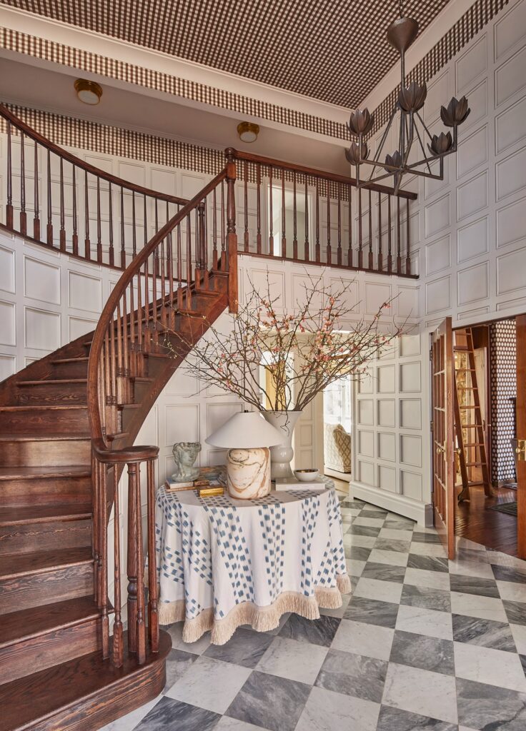 Beautifully renovated Tudor foyer showcasing a fresh, polished entryway with traditional character and thoughtfully updated finishes.