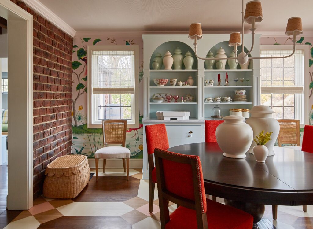 upstate new york colorful vibrant tudor dining room renovation. exposed brick wall and mural wallpaper. historic home renovation