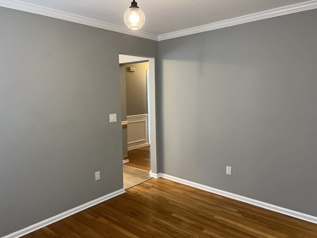 Builder-grade kitchen before renovation in a Chappaqua, NY townhouse
