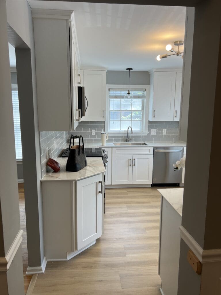Builder-grade kitchen before renovation in a Chappaqua, NY townhouse