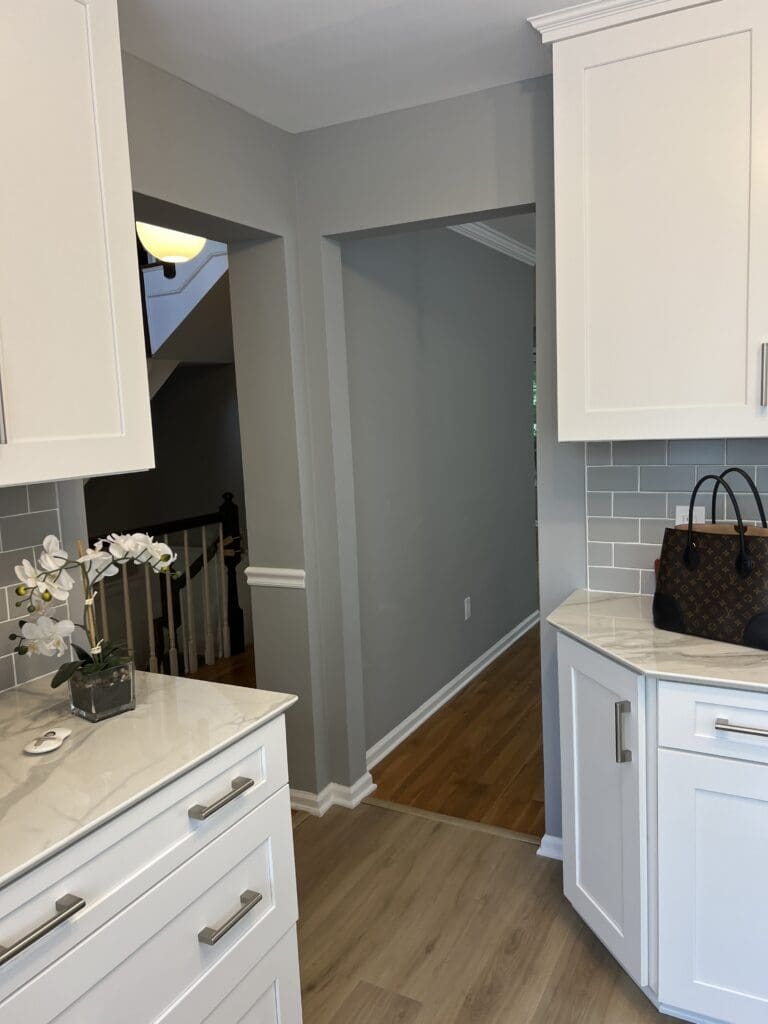 Builder-grade kitchen before renovation in a Chappaqua, NY townhouse