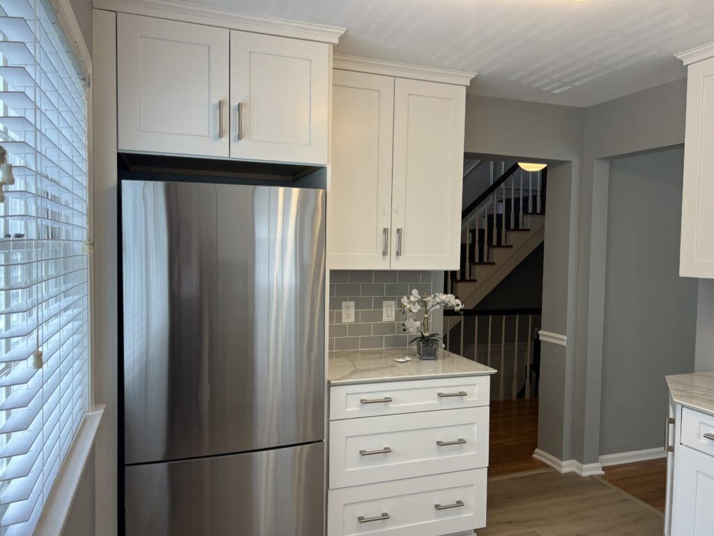 Builder-grade kitchen before renovation in a Chappaqua, NY townhouse