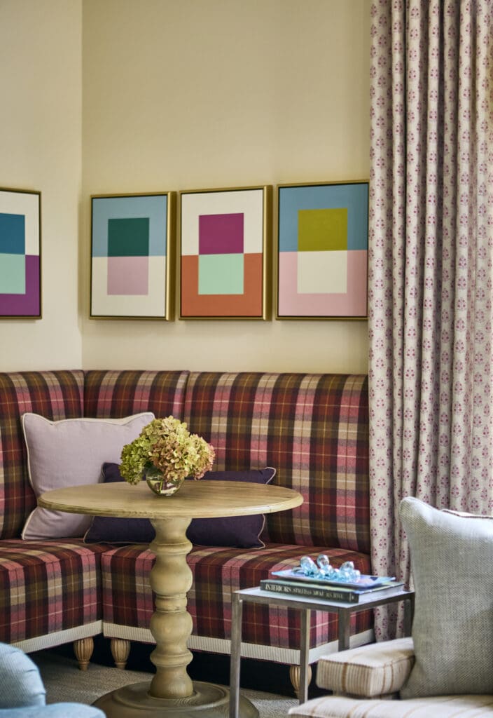 bergen county vibrant plaid corner banquette. traditional lively living room. home design solutions, historic home renovation. 