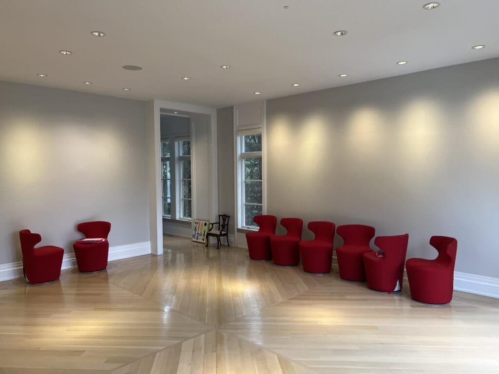 tenafly NJ before luxury home renovation construction. large open living room to get custom dry bar