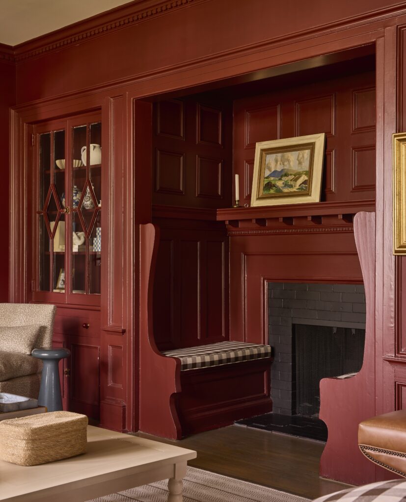 Chatham NJ Interior design inspiration, colorful red built in banquette design with original to home fireplace.